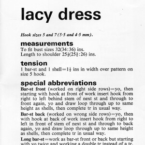 May include: A black and white text document with instructions for crocheting a lacy dress. The document includes measurements for bust size, length to shoulder, and tension. It also includes special abbreviations for crochet stitches.