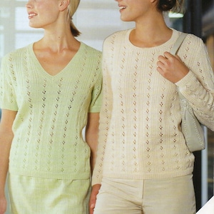 May include: Two women wearing light green and cream knit sweaters with a lace pattern. The sweaters are 4 ply and the pattern number is 5060. The text "Includes larger sizes" is on the bottom right corner of the image.