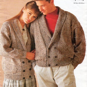 May include: Two people wearing brown knit cardigans with a speckled pattern. The cardigan on the left has a double breasted closure with buttons. The cardigan on the right has a single breasted closure with buttons. The person on the left is wearing a plaid skirt. The text on the page reads "3278/ Price Code C Aran by Wendy 76-112cm (30-44ins)"