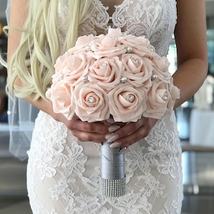 prom bouquet for pink dress So excited about another prom weekend! This hot pink bouquet was STUNNING