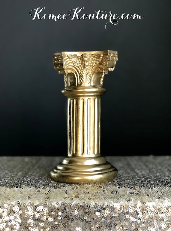 Gold pedestal on sale candle holder