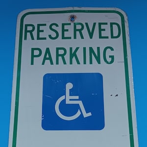 Vintage Metal Handicapped Reserved Parking Sign