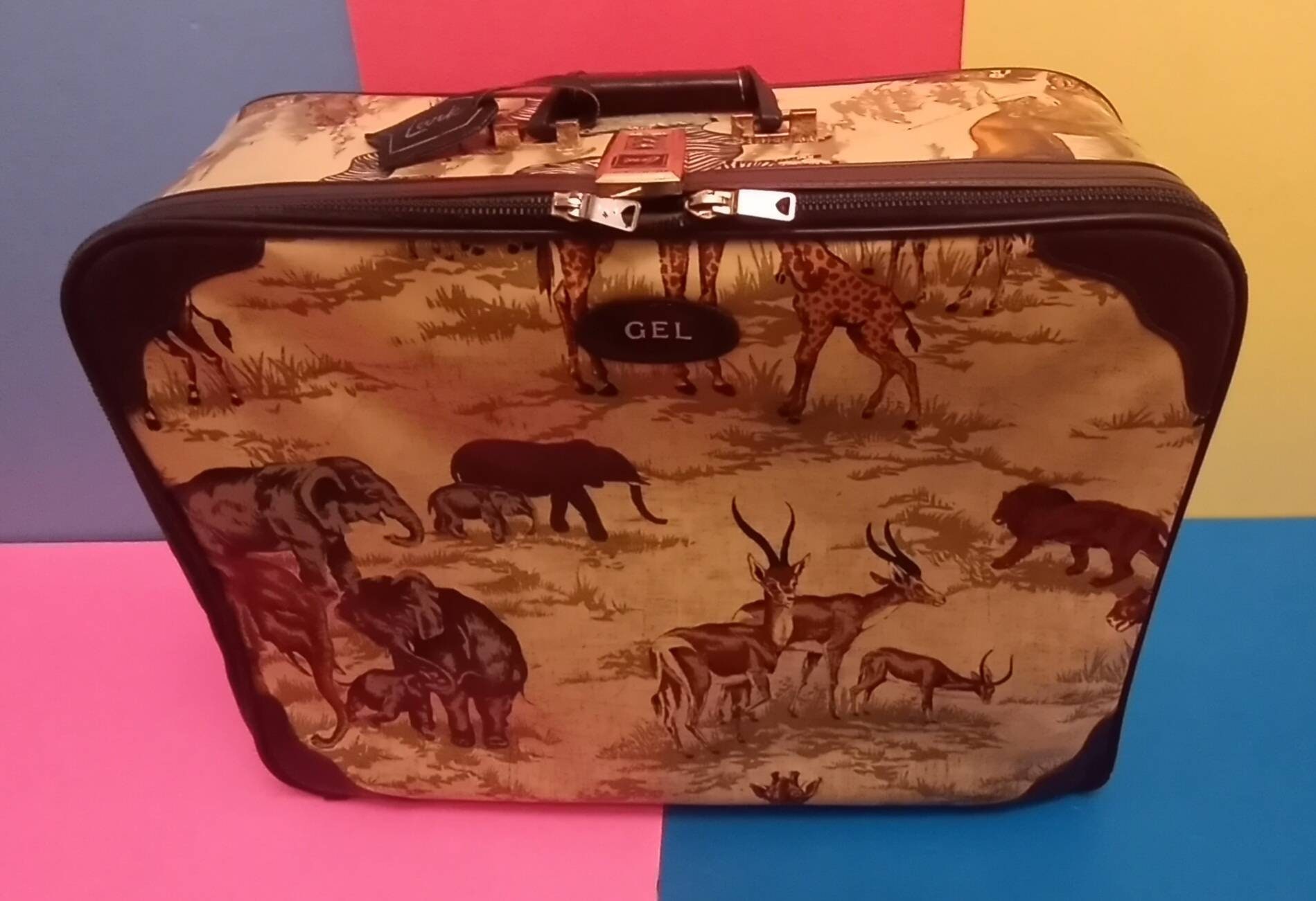 Vintage Vinyl Animal Print Suitcase by 