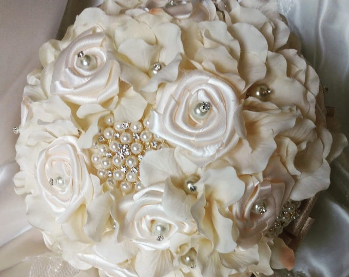 Ivory Brooch Bridal Bouquet with Ivory Hydrangea, Ivory Satin Roses, and Beautiful Pearl Brooches.