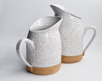 ceramic pitcher. White pitcher, Handmade pitcher, handmade pottery, one-of-a-kind pottery. Modern pottery & serve ware.  open shelving