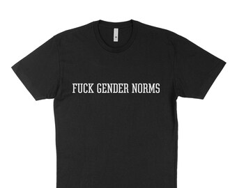 May include: Black t-shirt with the white text "FUCK GENDER NORMS" across the chest. The shirt has a crew neck and short sleeves. The fabric appears to be a soft cotton blend.