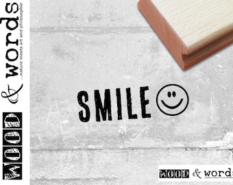 Stamp text stamp font-smile with smiley