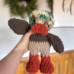 Mallard duck crochet pattern with textured wings and colorful beak details