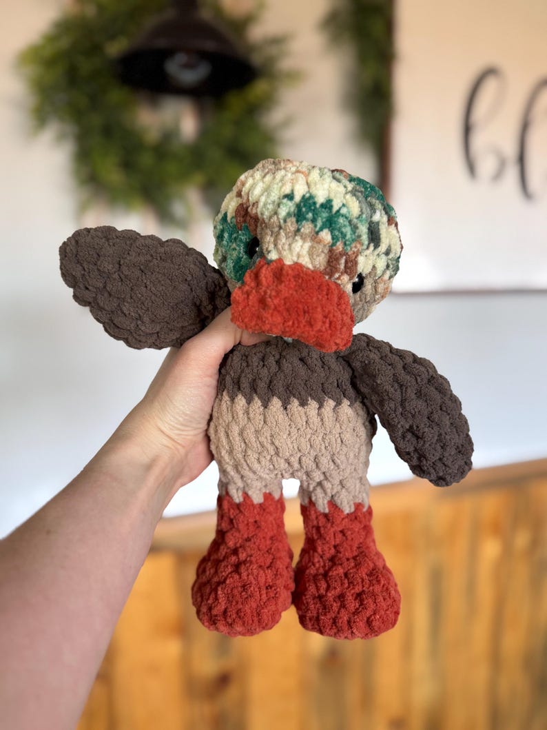 Mallard duck crochet pattern with textured wings and colorful beak details