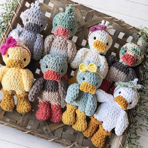 Finished duck crochet toys showing size and character details
