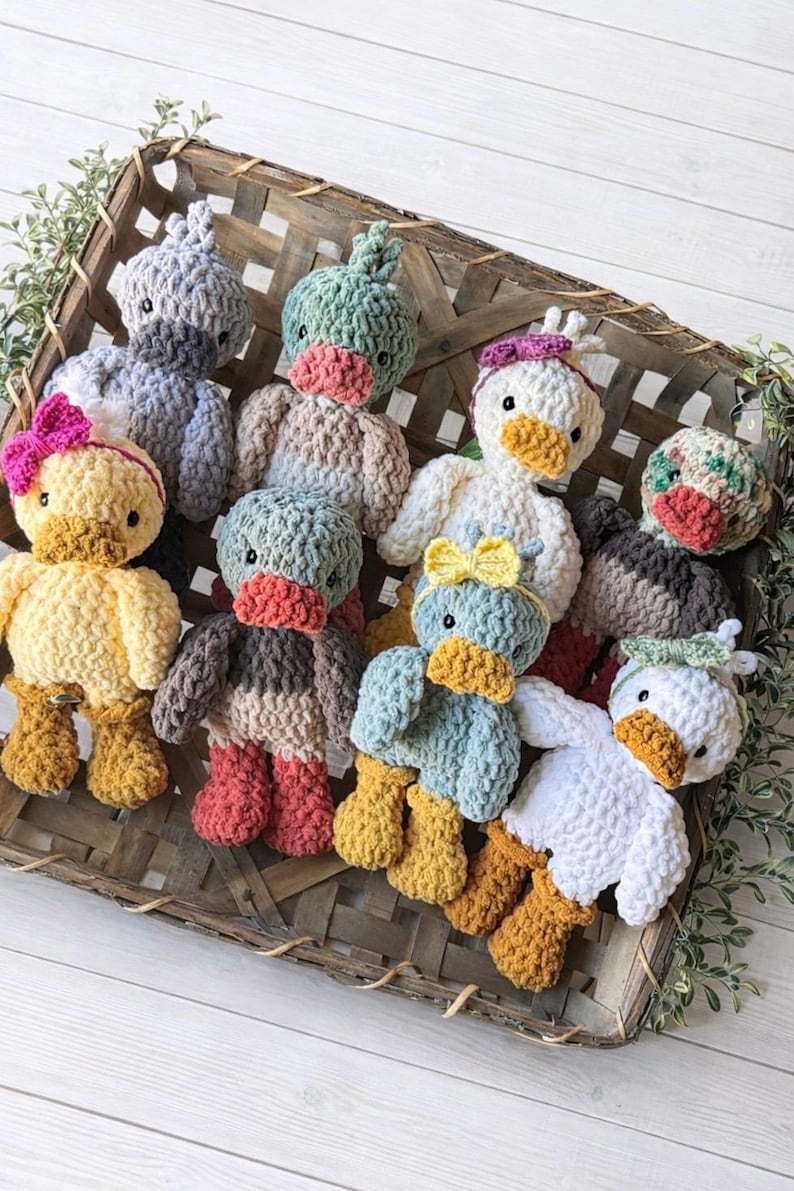 Finished duck crochet toys showing size and character details