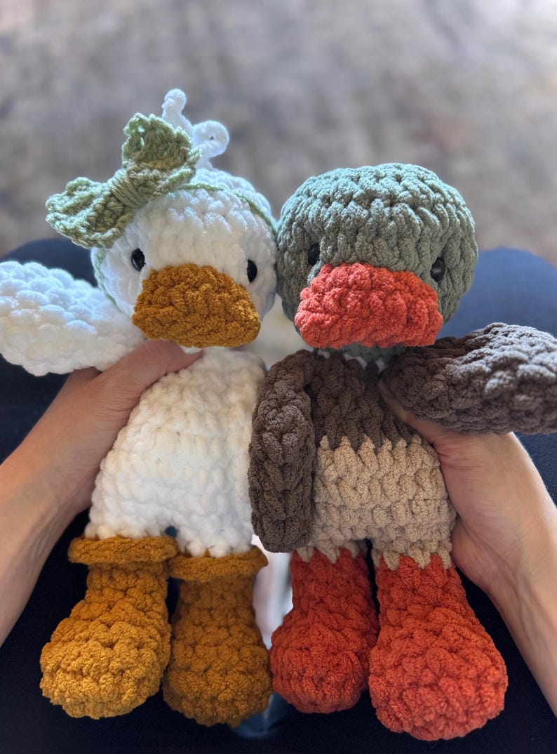 Duck amigurumi crochet pattern featuring two plush ducks side by side
