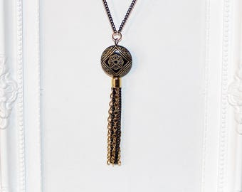 Flapper/Gatsby/1920's long black and gold necklace with carved deco beads & tassel