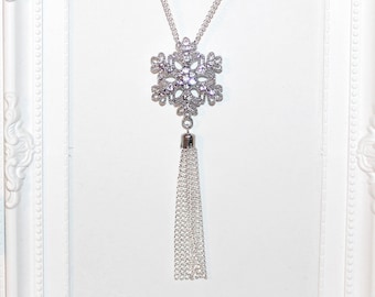 Long silver necklace with rhinestone snowflake pendant and tassel Christmas