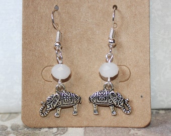 Cute carved elephant earrings silver plated with white crystal