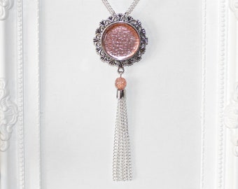 Flapper/1920's long silver necklace with light peach/coral/rose gold glass cabochon tassel pendant