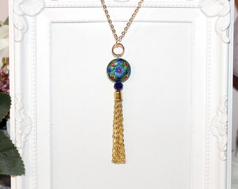 Long gold necklace with blue and green cloisonné enamel focal bead and tassel