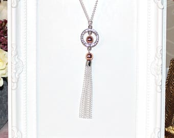 Flapper/1920's long silver plate necklace, rose gold hematite beads & rhinestone tassel pendant