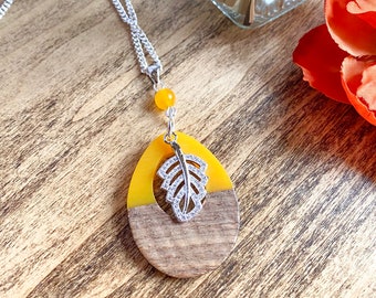 Wood and resin mustard yellow pendant and necklace with cubic zirconia leaf