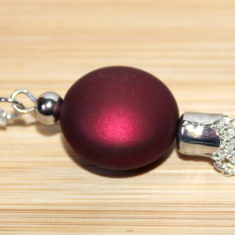 Long silver necklace with burgundy red focal bead and tassel pendant image 4