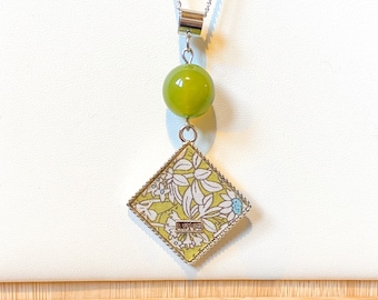 Silver plated necklace with khaki agate focal bead and floral fabric pendant