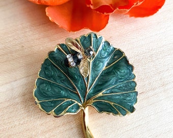 Vintage gold tone enamel and rhinestone bee and leaf brooch