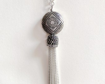 Flapper long silver necklace with carved deco focal bead, rhinestones and tassel