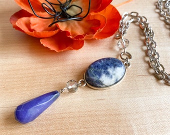 Long silver necklace with blue sodalite cabochon and agate beaded drop pendant