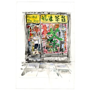 May include: Watercolor painting of a tea shop storefront. The shop's sign reads "The Best Tea Shop" in English and Chinese characters. The shop's window displays various items, and a person stands inside. Red lanterns and green Chinese characters are also visible.