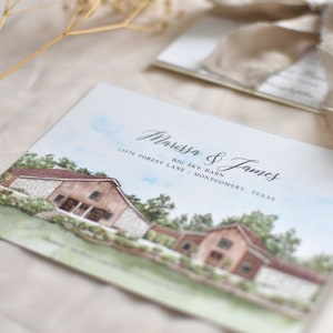 May include: A rectangular wedding invitation card featuring a watercolor illustration of a brown barn with a red roof, green trees, and blue sky. The text reads: Marissa & James, Big Sky Barn, 13576 Forest Lane | Montgomery, Texas, in black script and serif fonts.