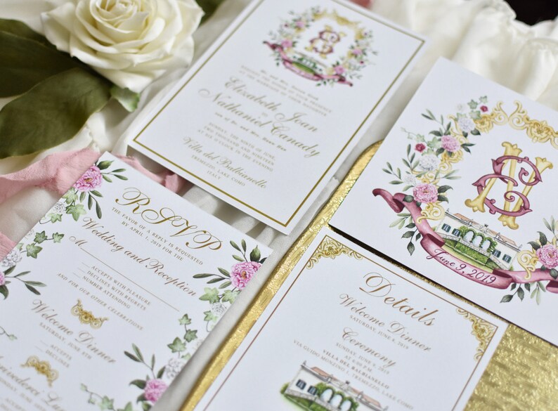 May include: Wedding invitation suite with floral details. The invitation features a watercolor illustration of a villa, a floral wreath, and the couple's names. The RSVP card has a floral border and the text "Wedding and Reception". The details card has a gold border and the text "Details, Welcome Dinner, Ceremony".
