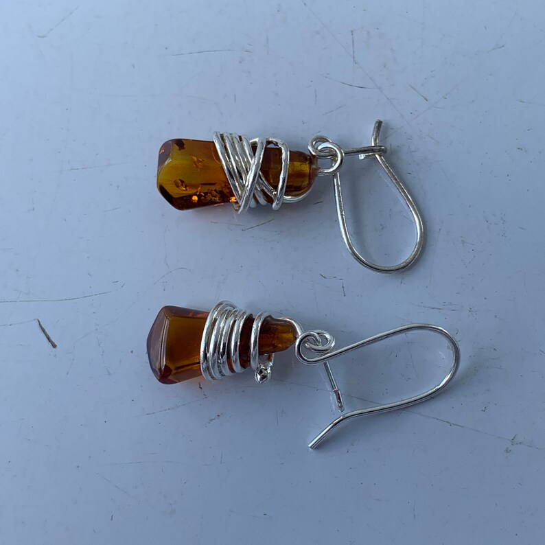Wire Wrap Baltic Amber Earrings Centered in Sterling Silver Accents Stunning Colors and Design Don\u2019t Limit Your Lifestyle