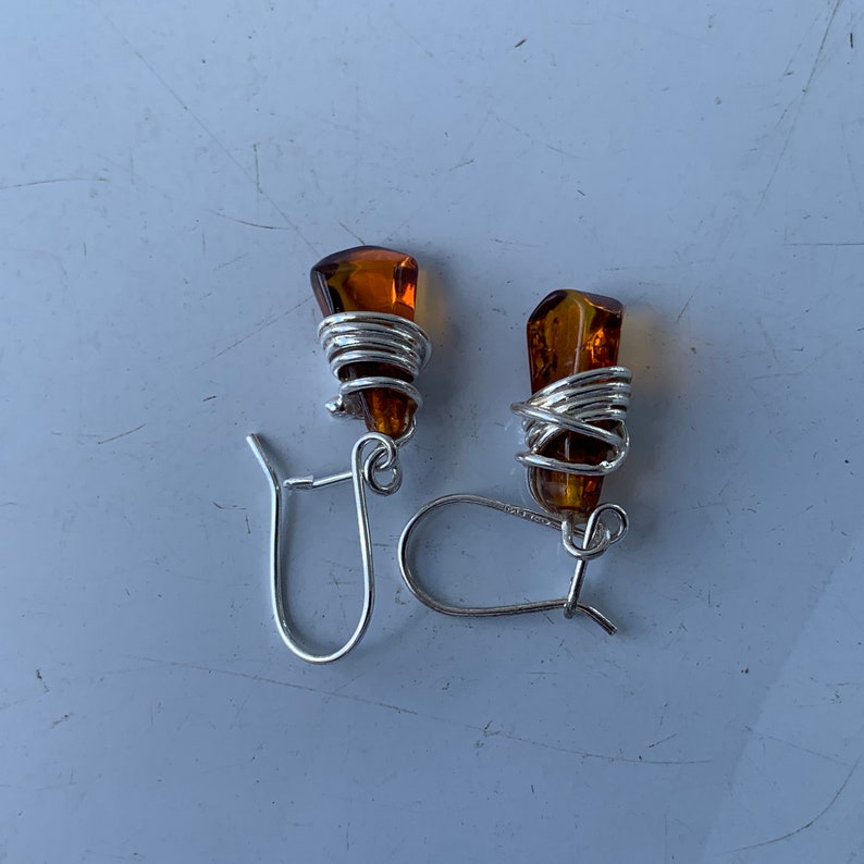 Wire Wrap Baltic Amber Earrings Centered in Sterling Silver Accents Stunning Colors and Design Don\u2019t Limit Your Lifestyle