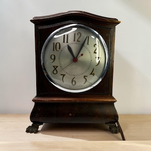 May include: A set of three ceramic mugs with a speckled, matte finish. The mugs are in shades of cream, light gray, and dark gray. Each mug has a simple, minimalist design, perfect for coffee or tea.