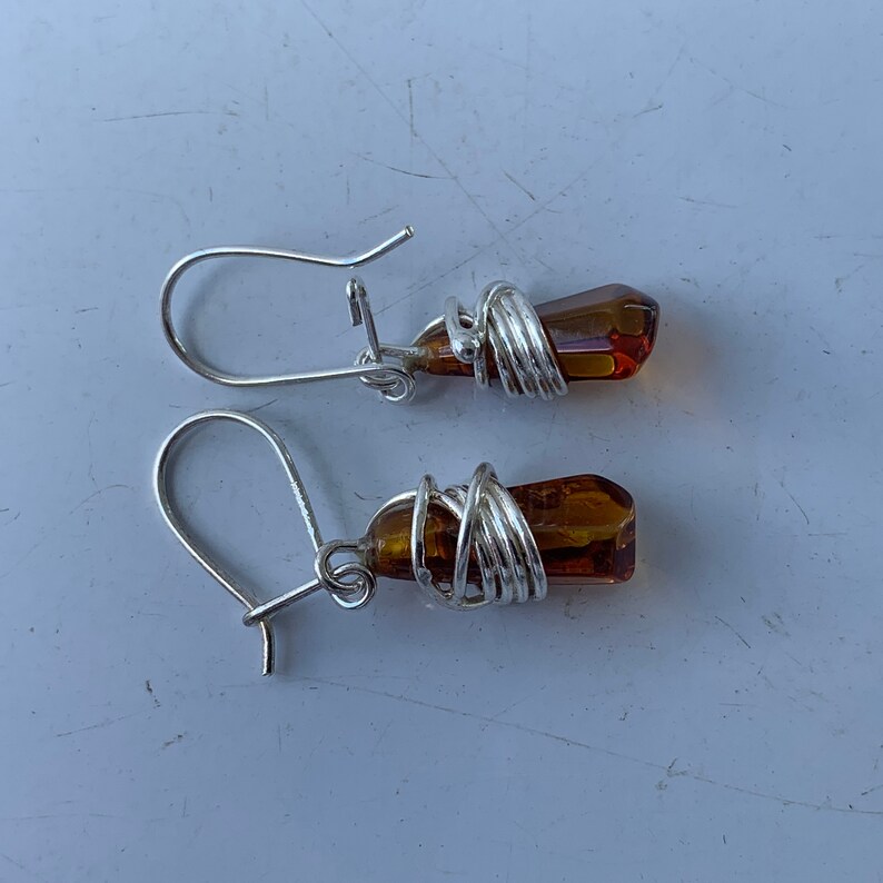 Wire Wrap Baltic Amber Earrings Centered in Sterling Silver Accents Stunning Colors and Design Don\u2019t Limit Your Lifestyle