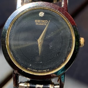 Women’s Seiko Quartz Watch 1N00-0C99 Black Dial, Stainless Steel Band, New Battery, Keeps Good Time, Vintage 2000s Ladies Timepiece Jewelry