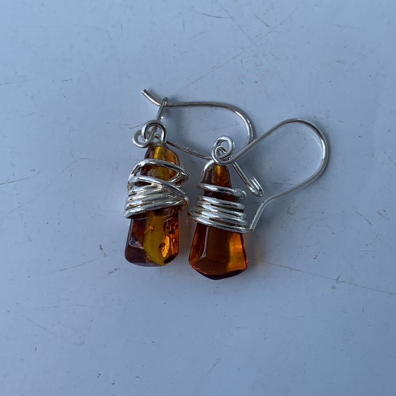 Wire Wrap Baltic Amber Earrings Centered in Sterling Silver Accents Stunning Colors and Design Don\u2019t Limit Your Lifestyle