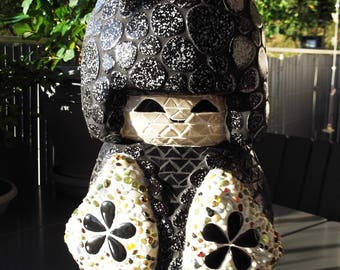 Japanese mosaic doll sculpture brings good luck