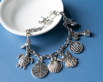 Diseña tu propia pulsera de dijes, crea tu propia joya de plata personalizada.