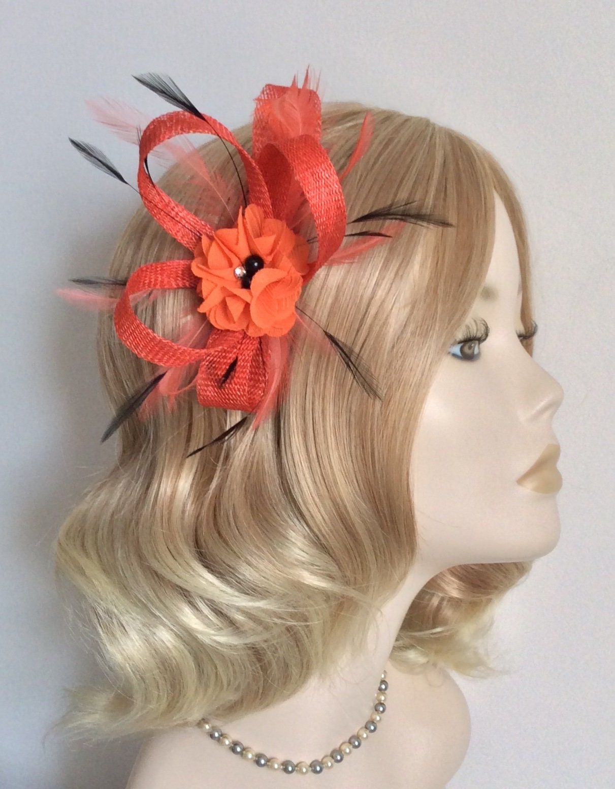 A BURNT ORANGE and BLACK Fascinator 