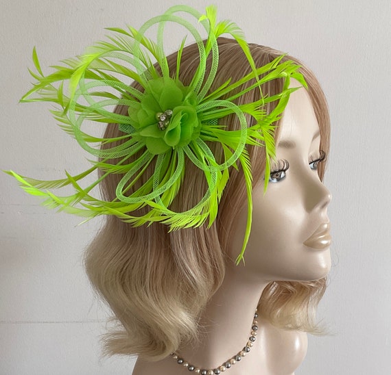 A Neon Green Feather Fascinator , with Tubular Crin, Chiffon Flower, On A Clip
