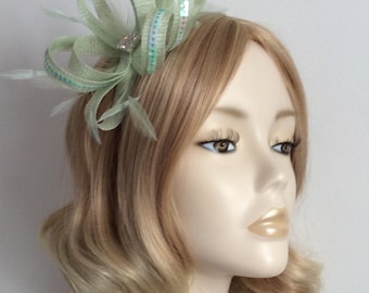 MINT GREEN FASCINATOR, with feathers, sequins, Square of crystals, Mounted on narrow silver headband