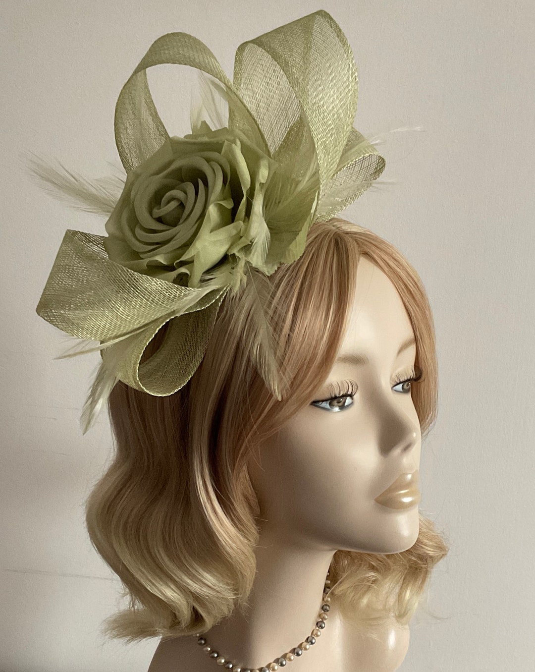 a-sage-green-fascinator-with-sinamay-feathers-silk-flower-etsy