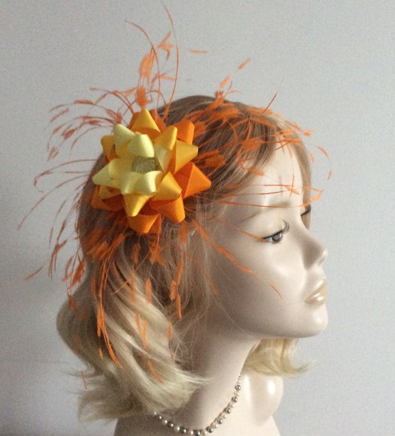 A NEON ORANGE and YELLOW Fascinator 