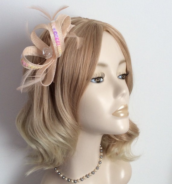 A PALE PEACH FASCINATOR Made With 