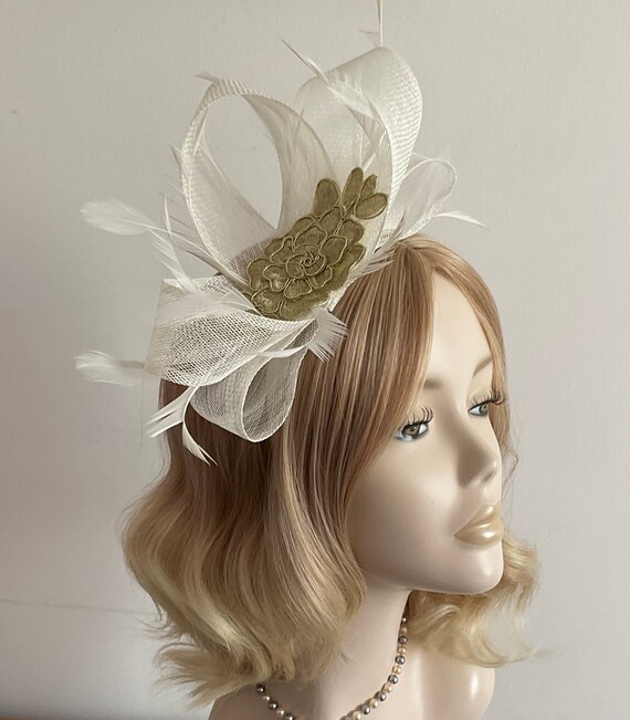 An IVORY and GOLD FASCINATOR Made of 