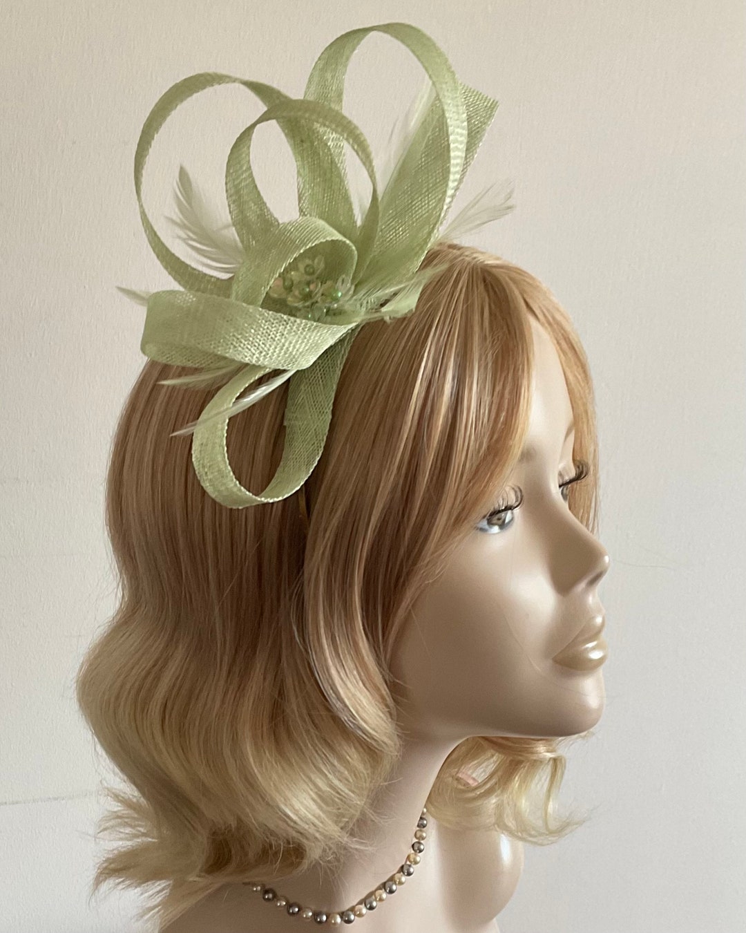 A MINT GREEN FASCINATOR With Sinamay Feathers Flower Bead Etsy