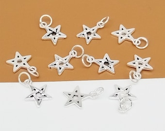 May include: Ten silver star-shaped charms with a detailed woven design. Each charm has a jump ring for attaching to jewelry.