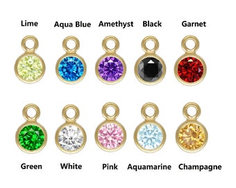 Puede incluir: Surtido de 10 abalorios de tono dorado con piedras redondas de diferentes colores. Los abalorios tienen un pequeño bucle en la parte superior para sujetarlos a joyas. Los colores incluyen lima, azul aguamarina, amatista, negro, granate, verde, blanco, rosa, aguamarina y champán.