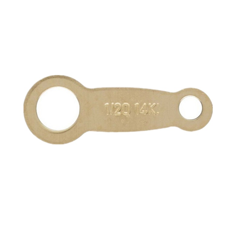 May include: A gold-colored metal jump ring with a 1/20 14K marking. The jump ring has a large round opening on one end and a smaller round opening on the other end.